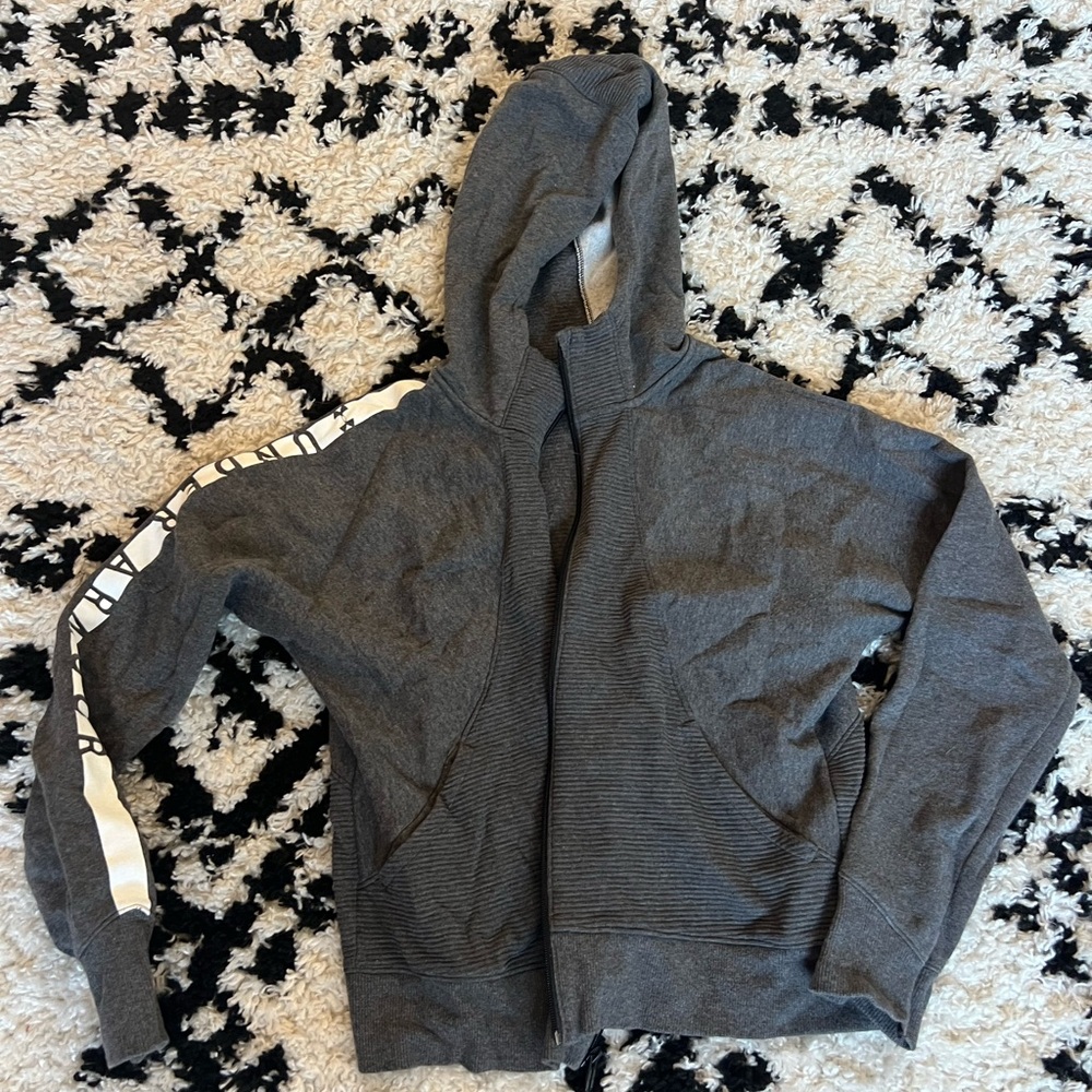 Under Armour zip up jacket, size M